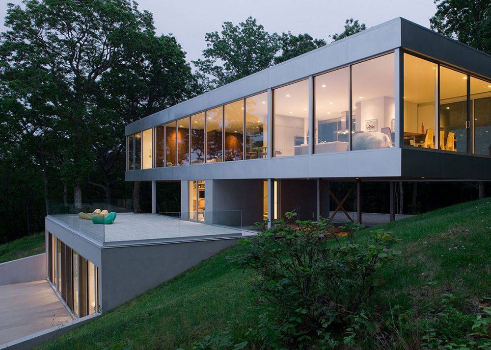 Дома в стиле «хай-тек» (79 фото): лучшие проекты одноэтажных каркасных домов с плоской крышей