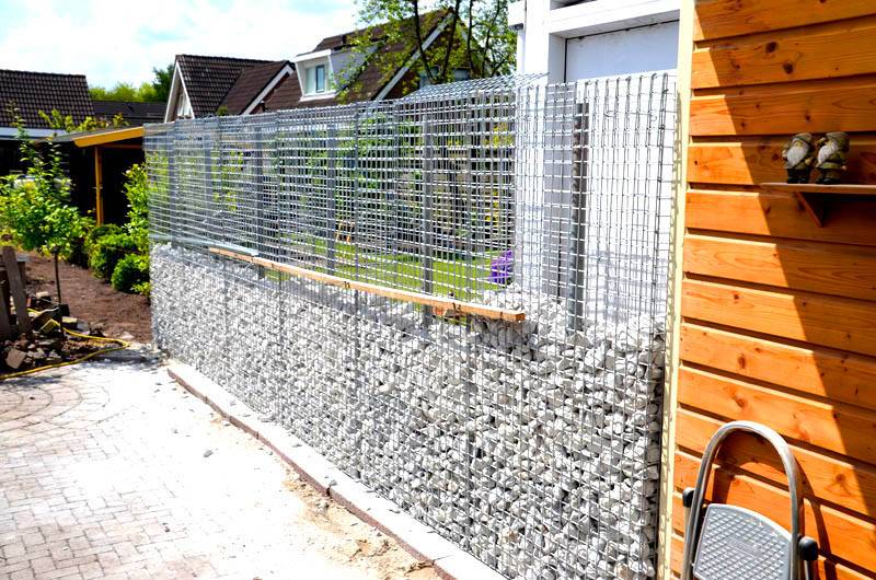 Забор из габионов (55 фото): технологии укладки камней, особенности габионовой и каменной конструкции