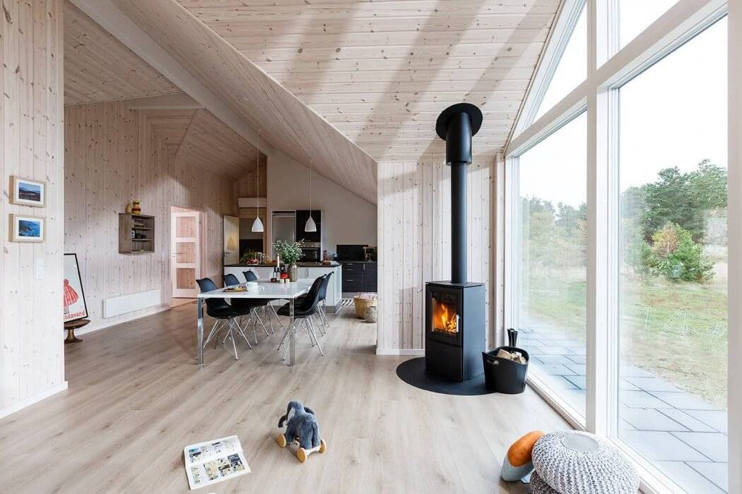 Современный интерьер гостиной в скандинавском стиле в загородном доме