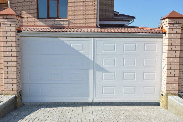Откатные ворота для гаража: преимущества, виды и особенности установки